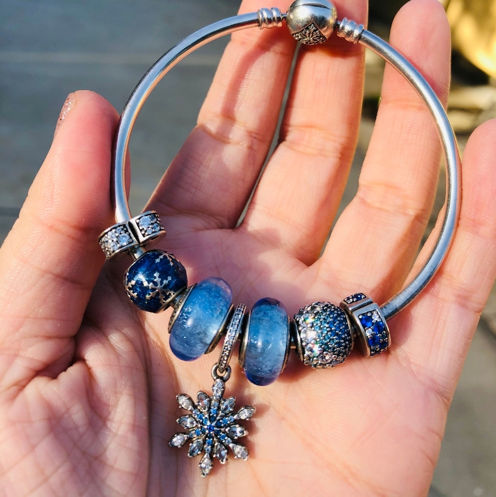 Pandora bangle with 7 charms blue